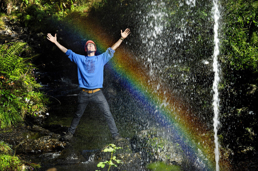 A rainbow created with sunshine and spray from a fountain jet at the “The Grey Mare's Tail” installation at the Environmental Art Festival Scotland
