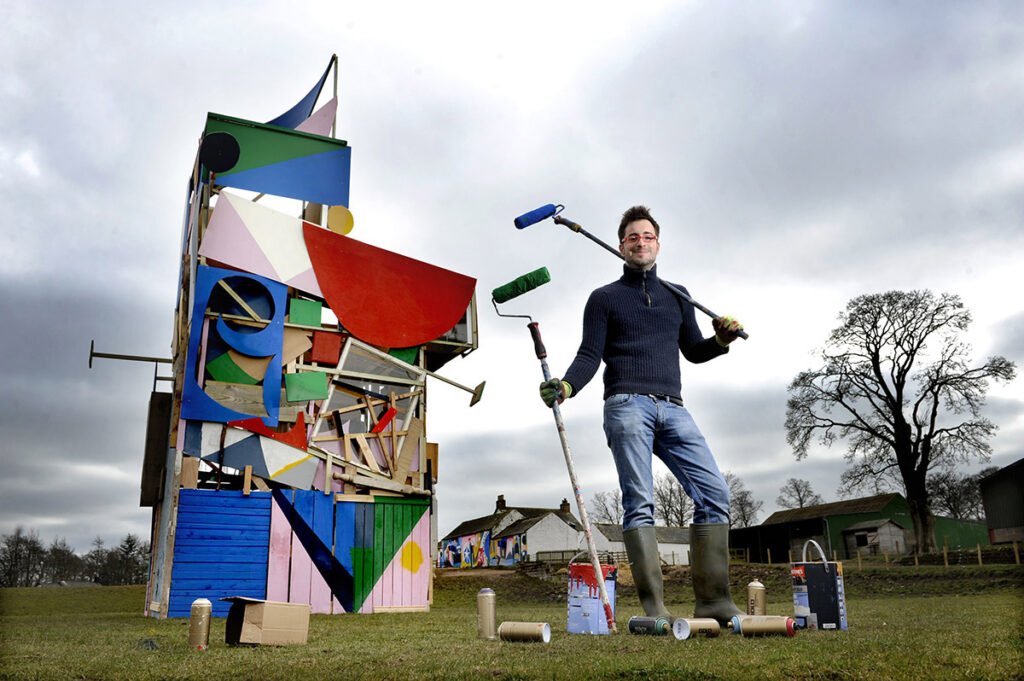 Artist Rory Laycock with a dovecot installation at Mossburn Animal Centre and part of Spring Fling’s “Rural Mural” series across Dumfries & Galloway